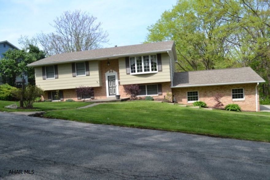 Fantastic 3-4 bedroom Bi-level in the Beverly Hills area on an exceptionally large lot. Has a two car attached garage with openers, a private rear deck with a patio underneath from the family room with a pool table.   A deep yard lined with trees that has a shed, firepit area and swing-set. The Master bedroom has an updated, nice sized completely remodeled powder room. Just updated the kitchen countertops, fully remodeled full bath on 1st floor with a suntube skylight. Basement update 3/4 bath . C/A updated with energy-saving heat-pump and a whole-house humidifier, ceiling fans, gutters, etc. A well cared for roomy home!  Don't miss it!!