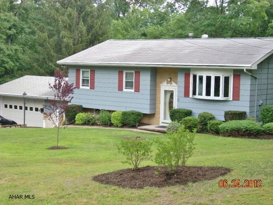 3 bedroom, updated bi-level home in private setting near Homer's Gap. Large lot, mature trees, central air, new windows, 2 car attached garage, and shed. Oak kitchen updated in 2006, newer furnace, finished family room and large bonus room on lower level. All appliances included. Everything you are looking for! Close to hospital and campus.