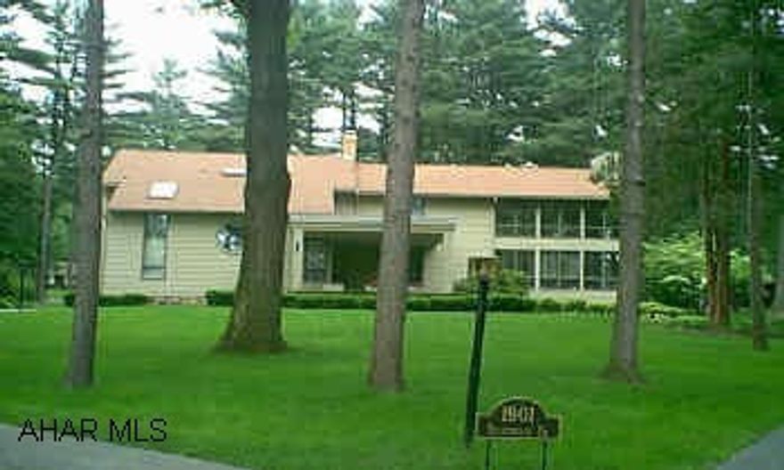 SPECTACULAR CONTEMPORARY HOME LOCATED ON A GORGEOUS 2.1 ACRE OF LAND - PROFESSIONALLY DECORATED AND LANDSCAPED.  GAZEBO AND POND WITH LARGE WRAP AROUND DECK.  NEW ROOF.