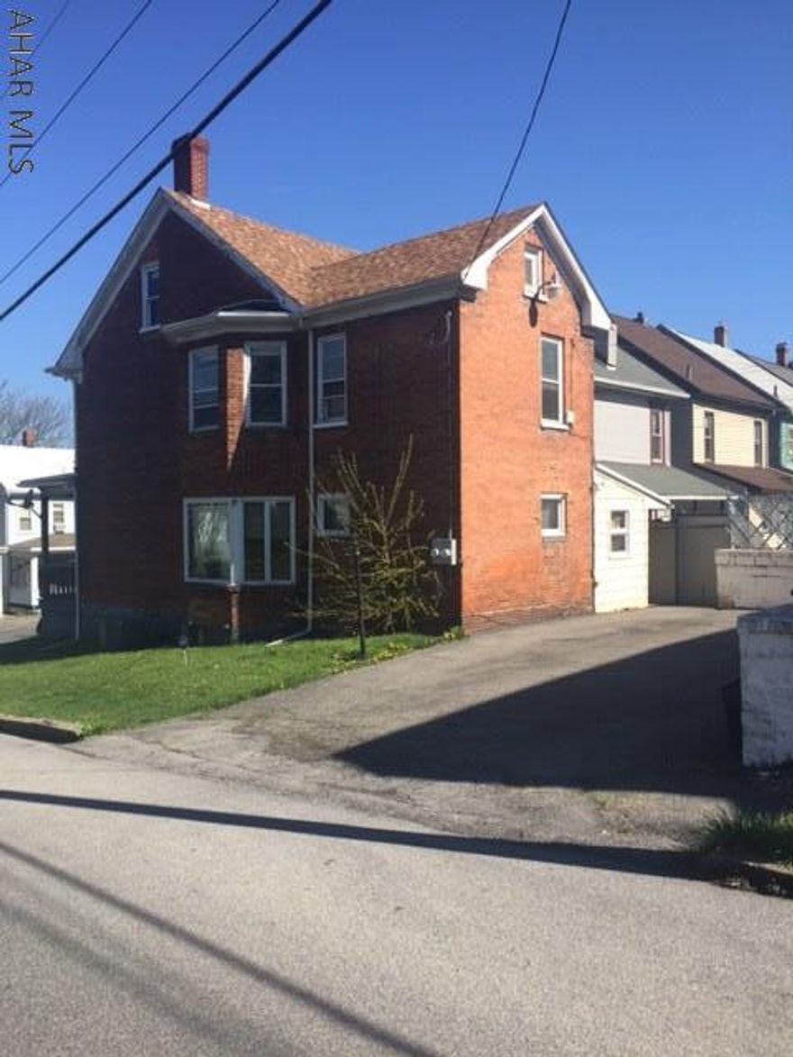 2 1/2 story brick duplex with 2 rental units. First floor 1 bedroom & second floor with 2 bedrooms  Heat is controlled by 1st floor tenant. 3rd floor has electric bb heat. Partially finished basement with laundry room for 1st floor tenant. Plenty of off street parking for 4 cars. Long time 1st floor tenant.