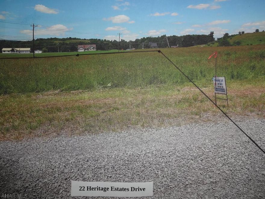 SEE VIDEO to view lots and location. Spectacular Views located at the foothills of the Allegheny Mountains. Nice, flat, wide-open building lot.  Deed Restrictions apply. Buyer is responsible for water, sewer and electric. (Lot 13) Additional Lots Available! The property did perk, permits have expired. New buyer will need to get perk for septic system and consult with the SEO.
