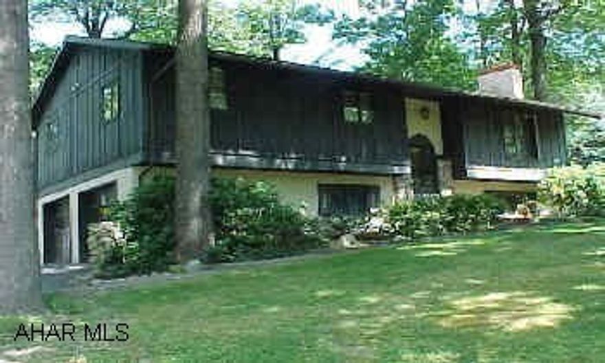 Move right in! Large wooded lot with nice 18x36 inground pool.  Bi-level home in the Bellemeade Estates. Three BR, fireplace, and lower level family room.