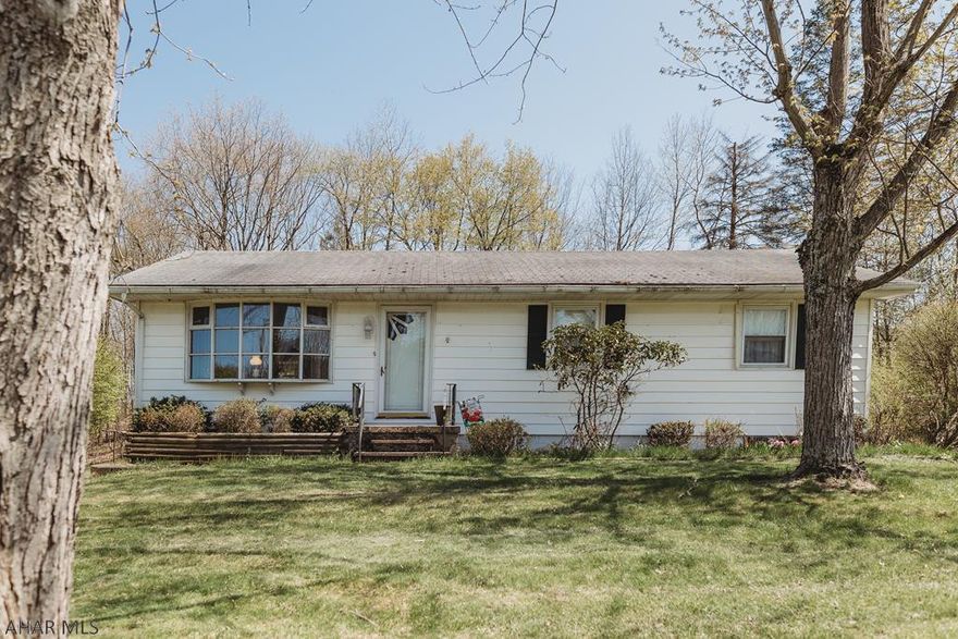 Take a look at this charming one story, 3 bedroom, 1 bath home! Features an open kitchen and a spacious living room. Includes a basement garage with extra storage and a covered patio.
