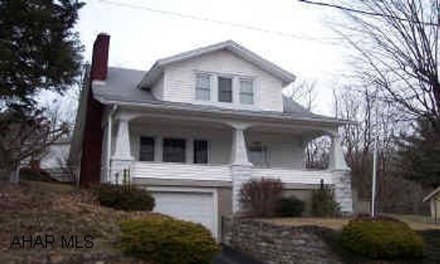 2 story stome and vinyl house close to town Well kept home with oak kitchen, fireplace and open oak stair way. first floor laundry and 2 car detached garage and one car integral.