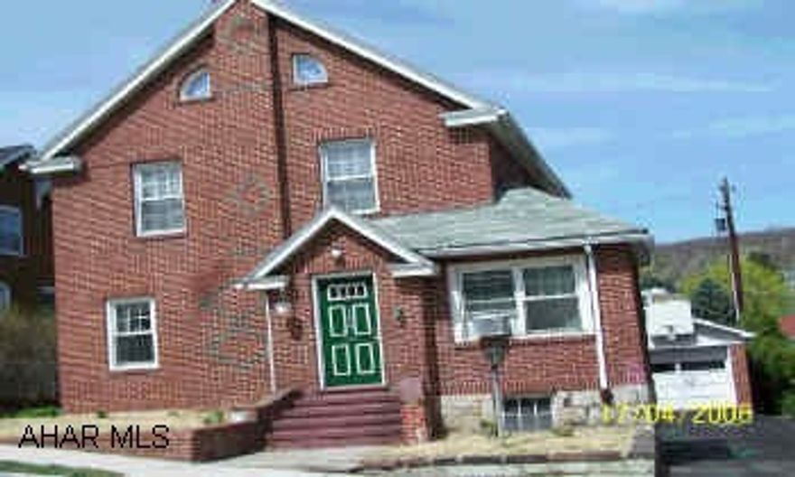 Older brick with hardwood floors.  Possible 4th bedroom in the attic.   Call Linda to schedule your showing 329-3076.  Hardwood floors in Living Room and Sun Room (need refinished).  New area rugs can stay. Reduced -  Call Linda to schedule your showing 329-3076.Hardwood floors need refinishing in Living Room and Sun Room (new area rugs can stay). Interior photo's - Take a look!
