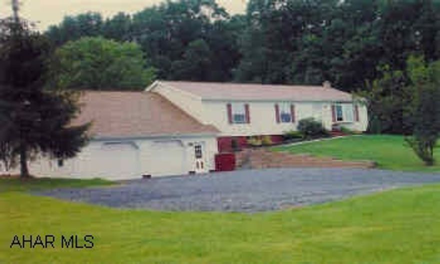 Beautiful Rancher in country setting with new garage built in 2000 on nice large yard, 2.06 A, with 2 sheds. Well maintained, nice yard and country setting, new vinyl windows and siding in Dec 2000.