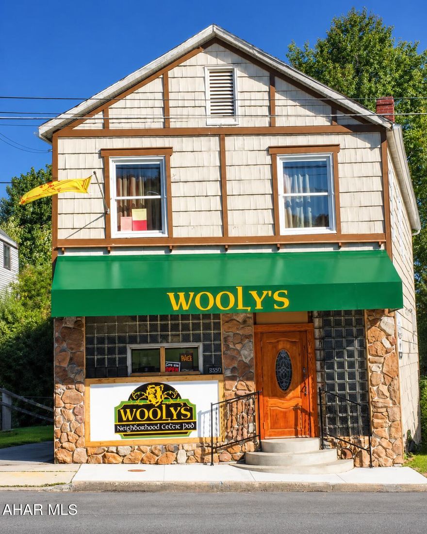 Turnkey tavern and restaurant opportunity with character, space, and built-in potential. Wooly's has been well maintained and refurbished while preserving the charm and atmosphere that make it a local favorite. The main level features a beautiful wood bar and side bar with seating for approximately 30 guests, a dedicated ''band room'' for live entertainment and dancing, and a spacious pool table/dining area measuring approximately 30x24 that accommodates much of the indoor dining space. Outdoor dining opportunities are available as well.

The commercial kitchen comes well equipped with fryer, griddle cooktop, 2-burner stove, microwave, oven, prep areas, and a POS system that allows orders to be sent directly to the kitchen for efficient service. A 16-camera security system provides coverage for both the interior and exterior of the property.

The upper level offers additional flexibility with a spacious office, prep area, full bathroom, abundant storage, and two rooms that could potentially be converted back into living space for an owner-operator setup. The basement includes laundry area, workshop space, utilities, and additional storage.

Sale includes an additional lot for expanded parking along with the liquor license featuring restaurant, Sunday sales, and amusement privileges covering both indoor and outdoor service areas. A rare opportunity to own and operate a fully equipped, turnkey establishment. Call today for your private showing.