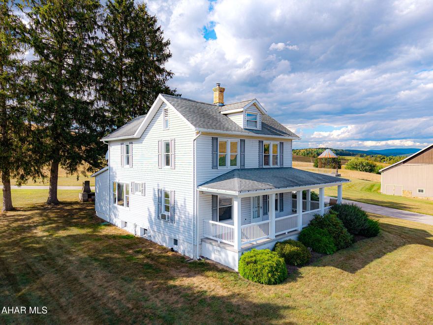 A Once-in-a-Lifetime Bedford County Estate

Set against the rolling hills of historic Bedford County, this renovated farmhouse is gracefully sited on 150 Â± pristine acres, with panoramic views that capture the very best of Pennsylvania's countryside. Surrounded by open sky, woodlands, and rolling fields, the land itself is the true crown jewel of this estate.

At the heart of the property lies a massive, private pond that feels more like a shimmering lake, a rare natural treasure where every step around the shoreline feels like entering another world. For those seeking even greater views, a gentle hike to the hilltop reveals a magnificent stone pavilion, crafted with stately pillars and a grand stone fireplace. From here, the eye travels 11-12 miles in every direction across pastures, treetops, and open sky-unmatched vantage point of Bedford County's landscape.

The farmhouse itself rests closer to the road, providing convenient access, yet it is perfectly positioned to overlook the lake, creating a peaceful and picturesque backdrop from the home. Beyond, the property unfolds into fenced pastures with high-tensile fencing, tillable acres, and spaces designed for both agricultural and equestrian pursuits. A beautifully restored barn clad in durable Hardy board siding blends rustic charm with modern resilience, while the oversized three-car garage provides exceptional storage and functionality.

A true hunter's and nature lover's paradise, the land is alive with wildlife. Deer, wild turkey, bear, and many other species roam freely, offering endless opportunities for outdoor recreation and a deep connection to nature.

Despite its accessibility, the estate offers a remarkable sense of retreat. With close proximity to I-99, Route 30, and the Pennsylvania Turnpike, travel to Washington, D.C., Pittsburgh, Baltimore, and Philadelphia is surprisingly convenient. The property is also just minutes from one of Pennsylvania's finest resorts, Omni Bedford Springs, offering fine dining, golf, and wellness amenities.

For the equestrian enthusiast, this property is unrivaled: a huge indoor riding arena with 15 horse stalls overlooks the lake, creating a breathtaking setting where horses and riders alike can thrive.

This is not just a property, it is an experience. A place where natural beauty, abundant wildlife, and equestrian excellence converge into a lifestyle of unmatched peace, recreation, and possibility.