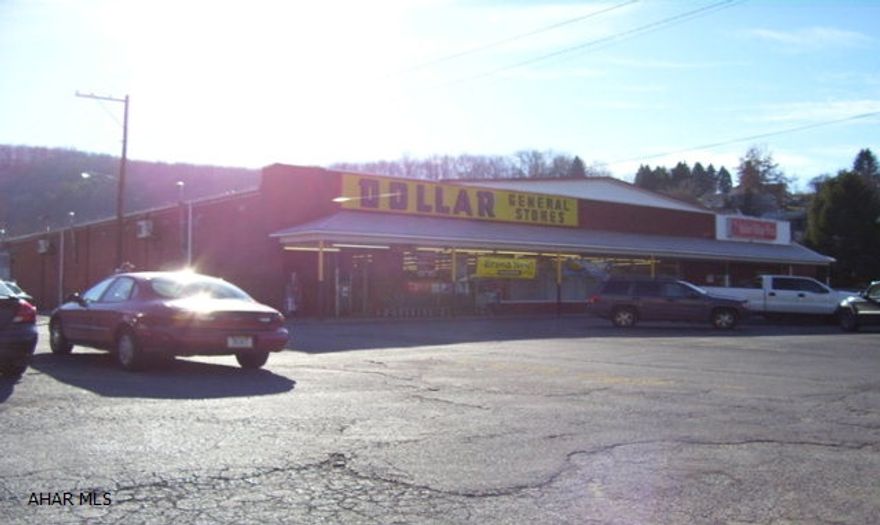 Investment Property in Northern Cambria. Anchored by Dollar General and Leased through 2020 then followed by two 5 rear renewals. Also includes extra parking lot and restaurant unit leased to Italian Village Pizza.  Total Income $80,220 Total expenses $14,072 Net $66,148