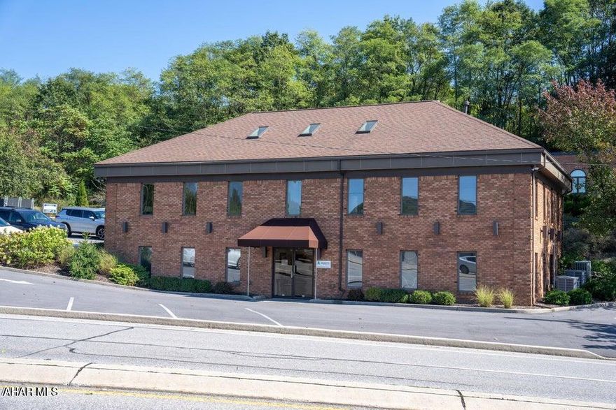 Beautiful landscaped brick exterior office building. 3,968 sq ft between two floors. The upstairs boosts a reception area, 5 offices, and powder room. The downstairs has a kitchen area, conference room, 2 offices, and powder room. Great Location! Plenty of parking. May rent first floor, second floor, or both.