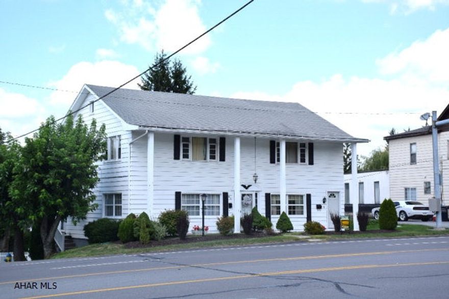 First floor family home with income producing second floor apartment.  Main level needs a little TLC (cosmetics)  but has great space including a large family room addition.  Private back yard with cute playhouse/shed.  One car garage.  Off street parking.