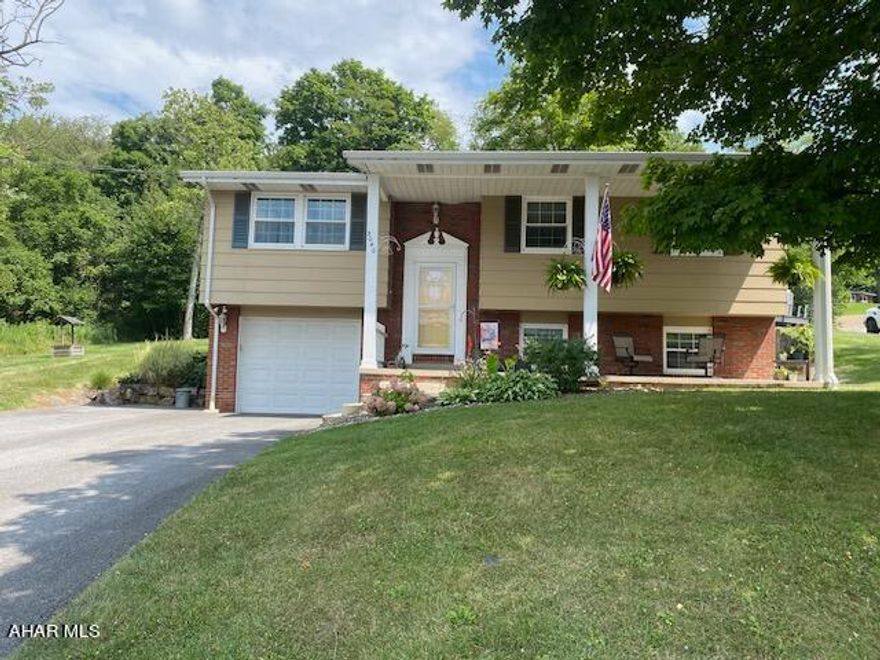 Check out this beautifully maintained move in ready home located in Hollidaysburg School District. The property is a 3 bedroom 1.5 bathroom home that has had many updates recently. These include newer windows, storm doors, roofing, furnace, central ac, water heater and flooring along with beautiful landscaping. This is a large corner lot conveniently located on a very quiet dead end street with quick access to Route 99 and 764. This property has wonderful natural lighting throughout and a large sunroom off the back of the home to sit and enjoy watching nature. A fantastic 12x22 patio adjoins and is a great space for entertaining and outdoor enjoyment. A large12x16 shed provides ample storage for all lawn and garden equipment as well. Inside the home there have been updates to maximize an open floorplan in the kitchen and dining area including a custom kitchen island with seating. Additionally the basement boasts a very large 18x24 family room currently used for entertaining and also has great storage space.