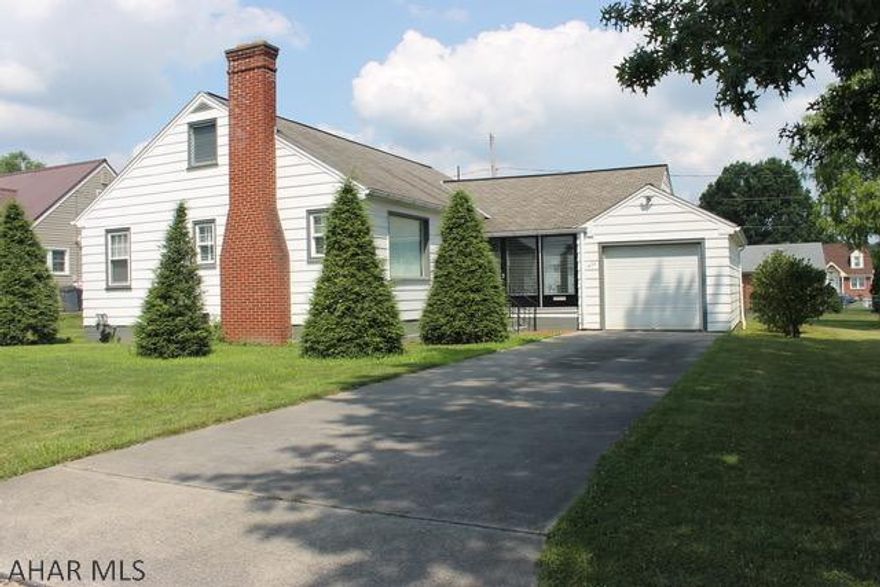 Adorable home located close to Hollidaysburg Jr High School.  Kitchen offers a lot of cabinets and additional convenient counter space when needed!!  Home has hardwood floors throughout, central air, knotty pine 2nd fl that would make a great 3rd bedroom and sunroom that access the front and back yard.  Call today to schedule your appointment!
