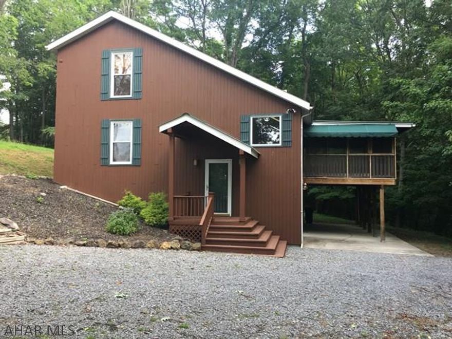 Fantastic Cedar Salt Box style home. 5 Minutes to Lake, many updates like new metal roof, granite counter tops, sky lights in Great Room,plenty of room for a growing family or invite guests, large screened porch, newer furnace with C/A.