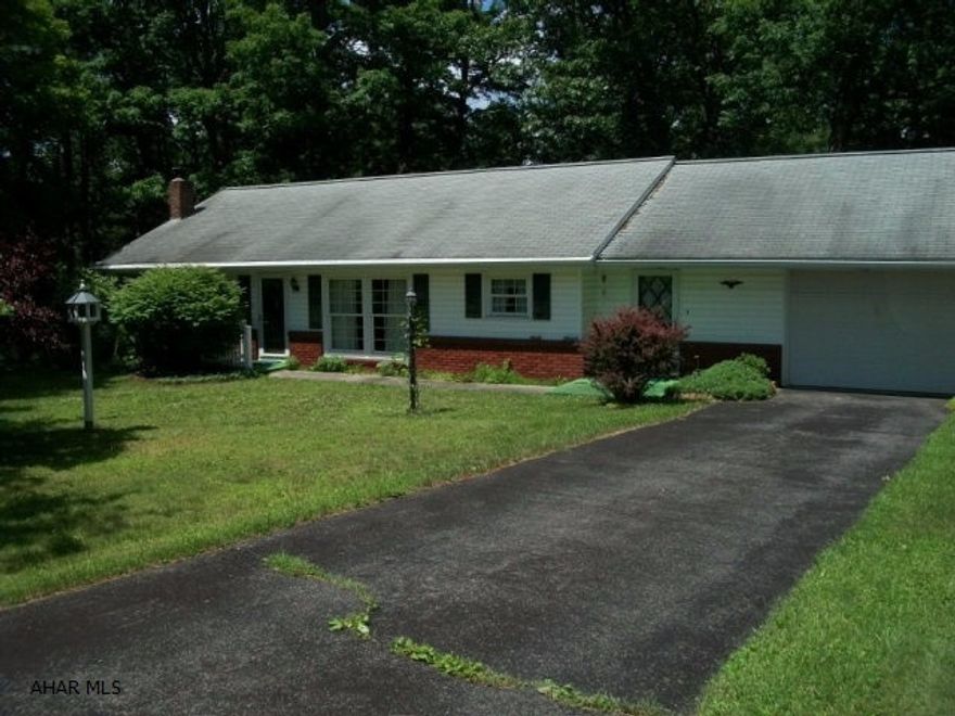 Well maintained ranch house minutes from Everett, Interstate 70, Pa turnpike, and 30/Lincoln Highway.  The property includes mature foliage, perennial flowers, covered large patio, and brick flower boxes.  The home has large new windows with custom draperies in front of home the brings in natural light and beautiful view of front yard.  The living area has an open concept and feel. There are 3 bedrooms, 1 full bath with basement plumbing for a second full bath. The breezeway between the garage and home is a peaceful resting place, reading spot or could be a great play room.  Lots of potential with this well maintained home.