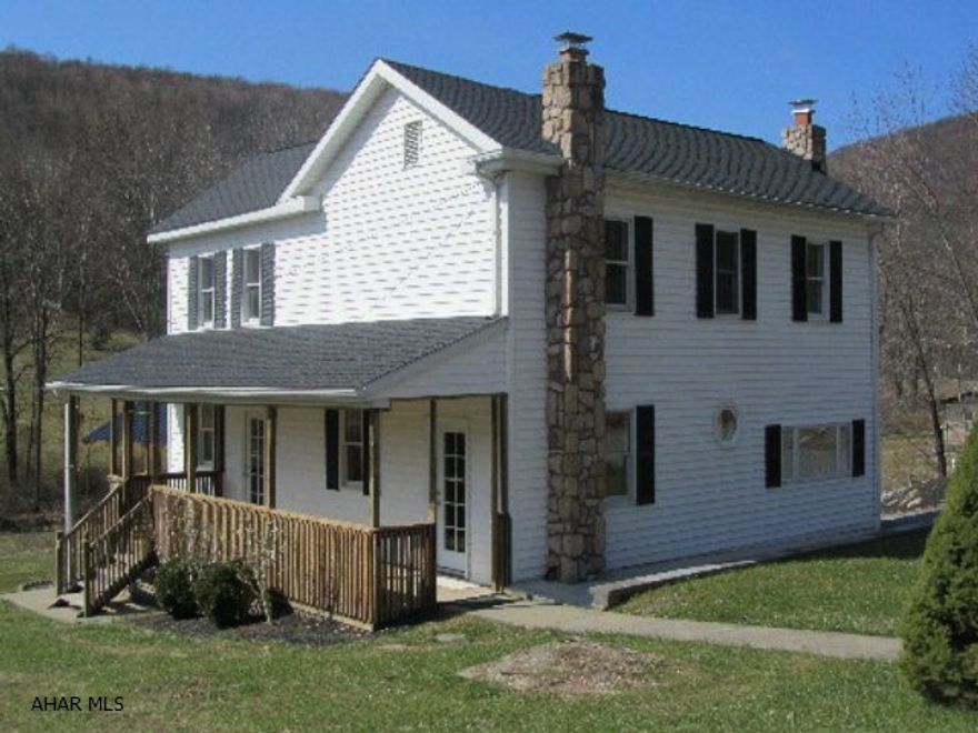 Home overflowing with WOW factor! Crowned with distinction, this exceptional 3 B/R, 2 bath home outshines the rest.  Every room has impressive updates.  Wait till you see the gorgeous hickory hardwood floors & kitchen cabinets, corian countertop, new carpet & ceramic tile floors, all new lighting & plumbing fixtures.  Even a pavillion on 1.3 acres. 1st floor laundry and full bath, fruit cellar.  Newer roof, hot water tank, furnace. Low taxes.