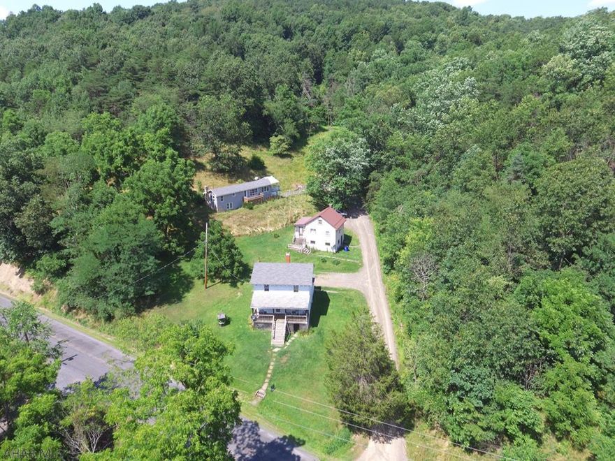 Motivated Seller! Endless possibilities with this property consisting of three home and 44 +/- acres! You could live in one of the homes and rent the other two out or rent all three homes and build a new home. Could also make a great hunting camp! Call for more details! Located not far from the PA Turnpike and I-99.  (Three Parcels: D.08-0.00-145, D.08-0.00-146, & D.08-0.00-176)
