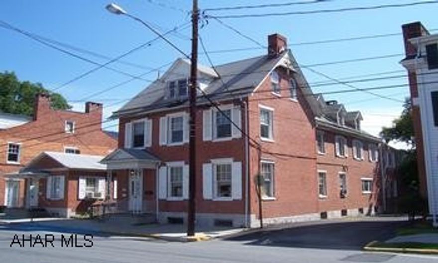 2 Buildings either Residential or Business/Professional Office Buildings. In the Bedford Historical District. The Building dates 1851-1875. Certian restrictions regarding renovations for properties listed in the National Registry of Historical buildings. The property supports 2 commercial buildings ( one orginally a home) paved and gravel parking. Approx. 25 parking spaces. BUILDING 1:  205 S Juliana St., 1 Story commercial building built for use as an office building with 963 sq. ft., Natural Gas fueled hot water system, no AC,metal roof. BUILDING 2:  211 S Juliana St., 2 1/2 story office building 4,792 sq.ft. full kitchen, offices, 1/2 bath, meeting/conference rm. in the garage section. 2nd floor, offices and full bath. 3rd floor storage. Shingle roof, several fireplaces, natural gas.