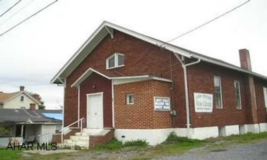 Built and used as a church.  1 large open room with Alter, Foyer and 1/2 bath. Full basement.  Good well and furnance. Great for small or start up congregation.  Also could be utilized for warehouse, office or converted into residential.  Good solid structure.  Loop Station Bible Church is dispanding and sale must be approved by the court.  Will include all fixtures and furnishings if purchased for a House of Worship.  Sale is subject to Court Approval.