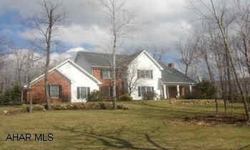 2 STORY 4 BEDROOM, 2.5 BATH HOME ON A 1 ACRE LOT. OAK KITCHEN WITH LOTS OF OAK TRIM. RAISED CEILING IN FOYER WITH SKYLIGHT, ELECTRIC DOG FENCE. STORAGE ABOVE GARAGE.  RADON REMOVAL SYSTEM IN PLACE.