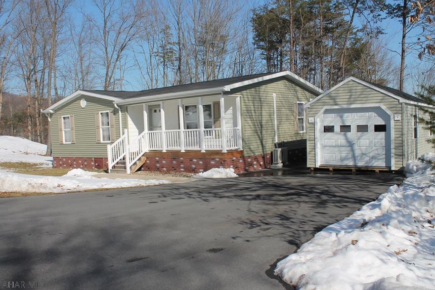 Welcome to this one story home with an open casual lay out. Move in ready !! This well kept. 3 bedroom,,  2 full bath ,, with laundry room HOME is waiting for you. This rented lot of 185.00 per month is located in a wooded setting with a nice yard.  Shed can be made to a One car garage. Home also offers a covered porch for those days we need to enjoy the outdoors. Schedule your Tour.