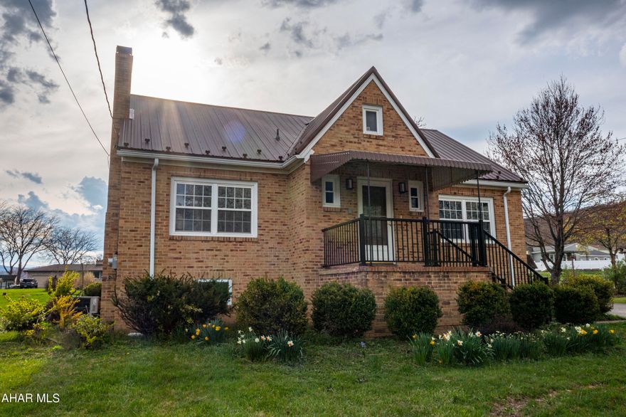 Come see this charming brick home located close to town and major highways! This home has been completely updated from top to bottom and inside to outside. On the first floor, there's a lovely master bedroom with a renovated en-suite bath and a spacious walk-in closet. Also on the main level, is a laundry room. Upstairs, you'll find two more bedrooms and a sparkling new full bathroom. The kitchen boasts beautiful quartz countertops.  The house features modern recessed lighting and durable vinyl plank flooring throughout. Other features include a new roof, updated electricity and plumbing, fresh new windows, and brand-new garage doors.