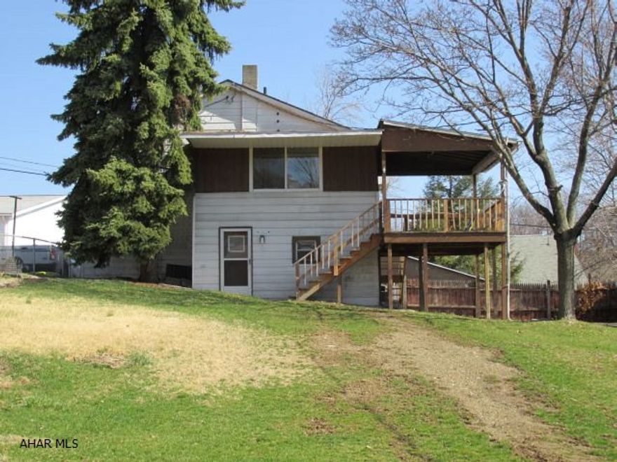 Cute 2 bedroom, 1 bath on large lot, covered deck, security system, central air, integral garage, new shingle roof just installed.