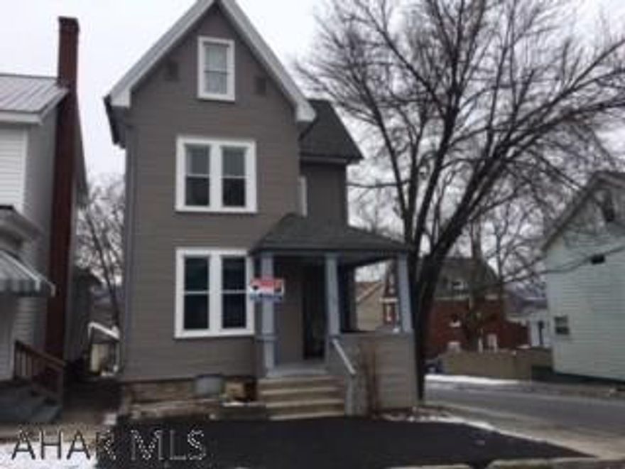 Great Investment Property or live in lower unit and collect rent from 2nd floor.  All new vinyl siding, new windows, new roof, 2 new furnaces, new main water lines from street, newer hot water tanks, Integral garage, all separate utilities.