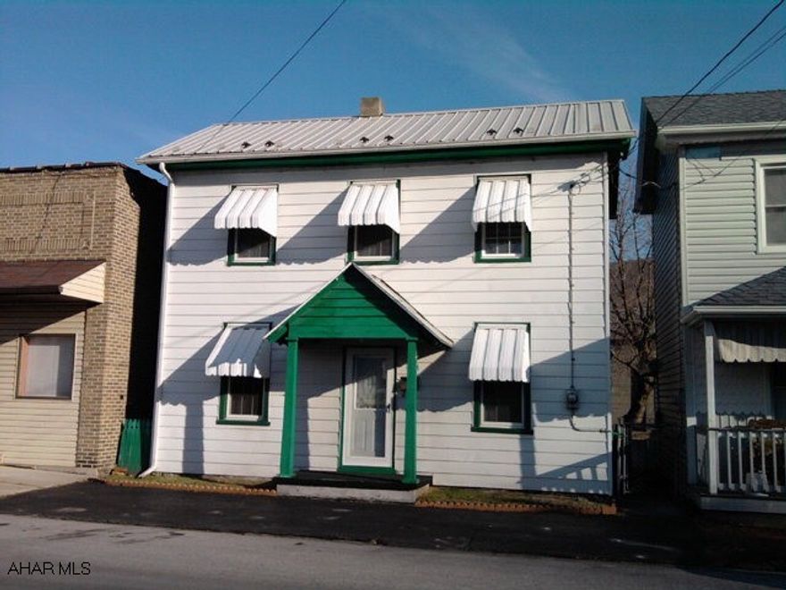 2 1/2 story, 3 bedroom home with thermopane windows. Gas hot water baseboard heat. New hot water tank.