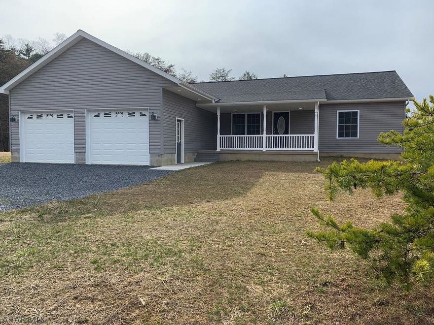 Enjoy panoramic views of the Allegheny Mountains through windows that allow nature to be part of this lovely ranch home set on 1.07 +/- acres.  Open concept floor plan includes a wonderful sit up granite bar that overlooks dining and living spaces.  Located in a separate area, the master retreat is spacious and the Jacuzzi bath makes relaxing a joy.  Recess lighting adds warmth to this energy efficient home that includes radiant floor heat in both garage and lower level.  Outdoor spaces include a covered porch and huge attached double car heated garage that provides water supply to wash vehicles indoors.  Easy access to Rt I99.  Great home for a terrific price!