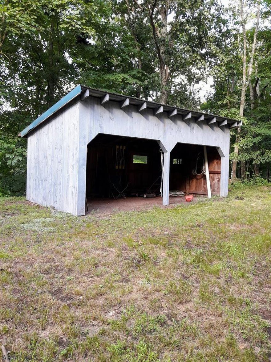 Recreational paradise. Enjoy 31 acres of prime hunting area bordering Buchanan State Forest.  Abundant wildlife!