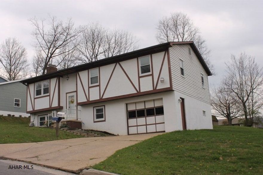 Add your personal touch to this bi-level home in a great neighborhood in Fairview! 3 Bedrooms, 2 baths, family room and additional room for office/den. Sliding doors lead out to a large deck overlooking the over sized back yard. Close to shopping and Penn State.