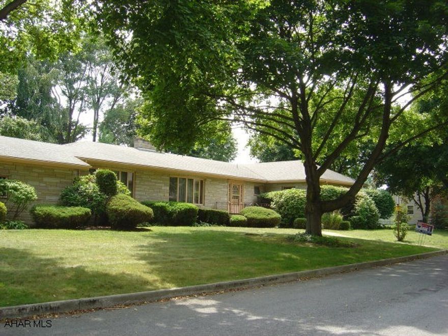 One of a kind Stone Ranch on level 185 X 120 lot.  Hardwood floors, 3 fireplaces, formal DR, LR, Family Room, 4 bedrooms & Laundry Room on first floor!!