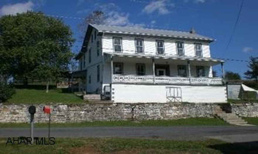 This house is not stingy on space.  Two-story colonial with original charm.  Property is located in a nice country setting that is within minutes to State Game Lands.  Updated vinyl siding, metal roof, and aluminum gutters.  Nice detached 24' x 36' garage.  Come enjoy the country.  (DIRECTIONS:  from Bedford:  Route 30 East to a right onto Route 326.  Route 326 for 2.5 miles to a left onto Ott Town Road.  Go 8/10 of a mile.  House on left.