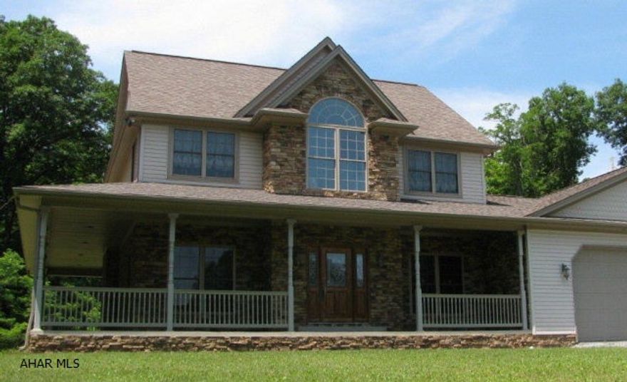 Stone & vinyl home on 8 acres in BASD. 35x36 oversized garage w/storage, 400 amp electric service, oak kitchen w/solid surface countertops, ceramic tile floor and stainless appl., oak trim, and solid oak doors thru out, hardwood floors, french doors, stone gas fireplace, wrap around porch, basement  w/ built in gun vault room. rough in for 3rd bath