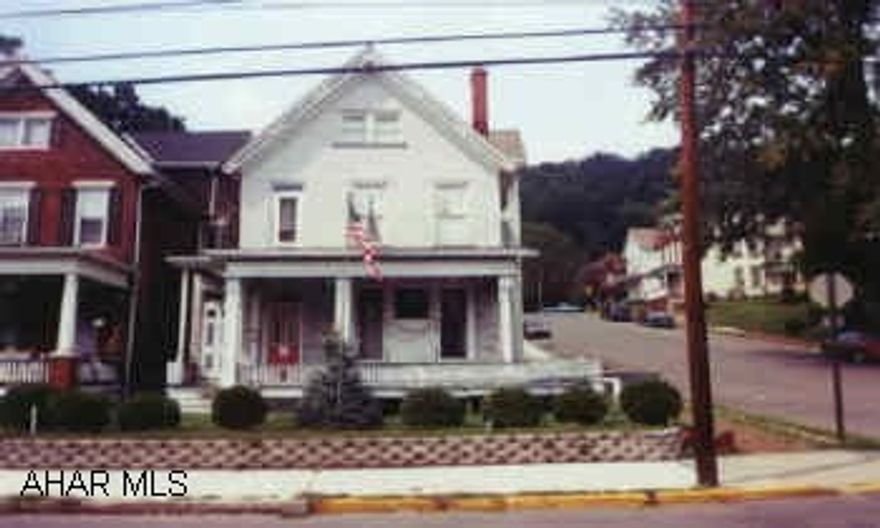 Large 2.5 story brick.  Could be 3 apartments.  Good investment property.  Sold as is, needs work.