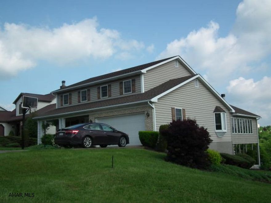 This 4 bedroom, 2.5 bath home is ideally located in the desirable neighborhood of Penn Farm.  Beautiful hardwood floors in dining room and formal living room.  Kitchen has eat in with great cabinet space.  Family room off kitchen which leads into all seasons room with vaulted ceiling, stone fire place, allowing additional space for family fun or entertaining with a great view of the area!  Newer mechanics and large unfinished basement waiting for your finishing touch!