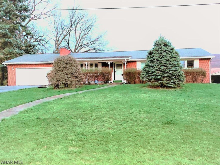 Welcome to this fantastic, well maintained 1 story brick home with a large basement in the heart of Hileman Heights. Brick exterior is maintenance free. W/4 BRs, large kitchen and living room with gas fireplace (converted from wood burning) and a large backyard with 3 buildings perfect for man-cave, she-shed and storage. Attached 2 car garage, gas water heat and central air conditioning. Basement, which is another 1600sq ft, includes kitchenette, laundry area, recreation room w/fireplace, workshop and powder room with shower. Your next home is central to shopping, schools, healthcare, and just minutes from I99. This is a great opportunity to live in a quiet neighborhood with a view of the mountain in your backyard.