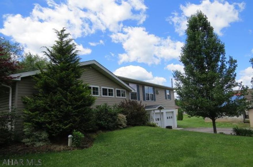 This fantastic home in Bellwood School District checks every box on your list and more!  Tucked away in Pinecroft on over 1/2 an acre this 3 bed ,2.5 bath home has been completely gutted and remodeled in the past 10 years.  The masterbedroom has its own wing with large master bath, walk in closet, and access to back porch.  The eat in kitchen boasts stainless steel appliances, granite countertops hickory cabinets, and a view of the back yard. With natural hardwood floors throughout the main living level, large closets, and tons of natural light this home is truly move in ready!  Not only is there a 2 car attached garage, but the additional 3 car garages that are detached are included.  Something like this will not last!  Call listing agent for more information!  Open House 6/23 from 12-2pm