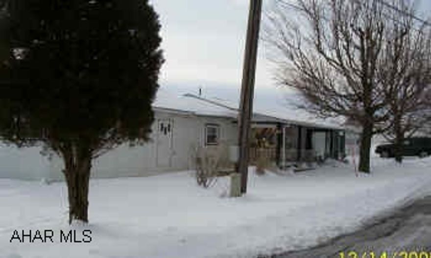 mobile home with addition and 2 car heated garage-on deeded lot mobile home was built in 1973(holly park), addition 1980, garage 1979.