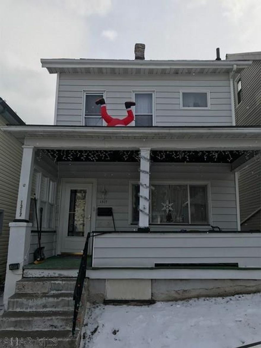 Move in ready three bedroom one bath home with a garage.