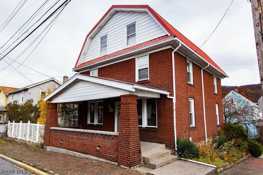 Solid, brick 4 bedroom 2 full bath house on corner lot. Freshly painted. New carpet. Spacious rooms. Nice front porch and back yard.