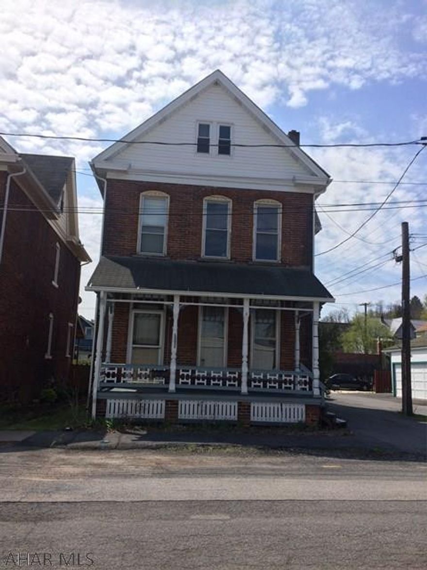 Spacious 2 1/2 story brick home in Tyrone Borough. Large eat in kitchen has plenty of cabinet and counter space. Off of the kitchen is a walk-in pantry. Dining and living rooms have heated floors and feature pocket doors. New carpeting on steps and 2nd floor. Home has 3 large bedrooms and a smaller room that could be used as an office. Large attic for storage or finish it for more living space. Outside is great for entertaining family and friends, enjoy the deck, hot tub and pool this coming summer.