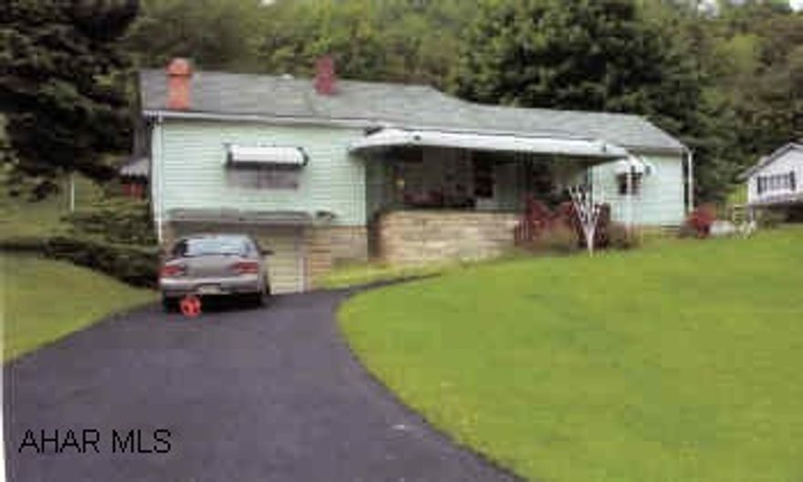 Well maintained home on 1.8 +- acre lot.