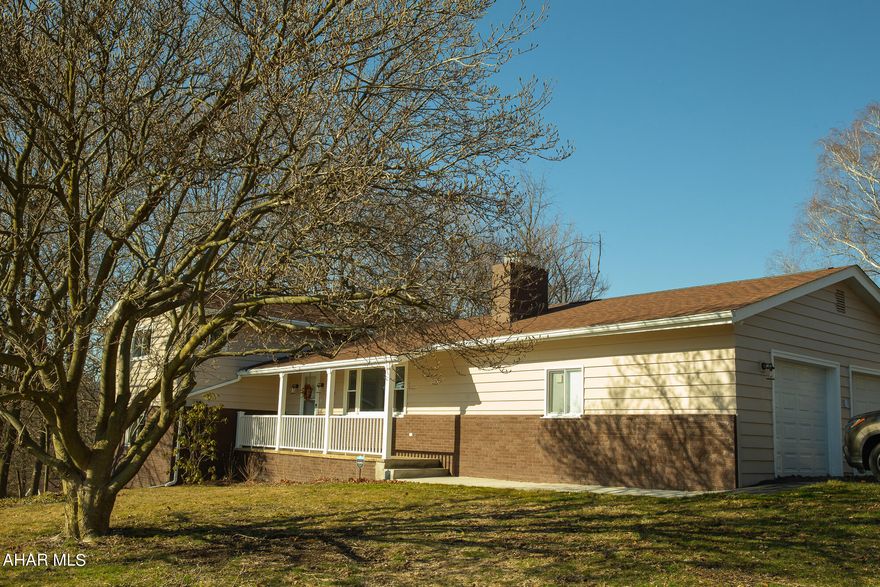 This move in ready home was remodeled from top to bottom!  New floors, windows, kitchen, appliances, paint, too many to list! Just bring your personal belongings and call this place home!  Conveniently located for easy commutes, but far enough away from the hustle and bustle. Enjoy scenic views from the covered porches.  A great oversized attached two car garage to keep your vehicles out of the weather.  Ample storage! This is a must see home! Great location! If you're looking for a move in ready home, this is the place. Text/call the listing agent today!