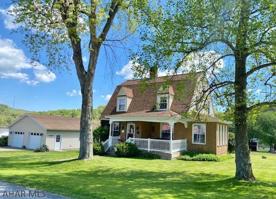 Charming country 2 story brick located 29 miles from Altoona.  Lots of house for $149,900 plus integral garage and attached garage and L shaped deck.  Updated kitchen including hickory cabinetry, corian counters & all appliances.  First floor Bonus Room could be 4th bedroom.  Heated sun room off the living room.  Under carpeting in living room & flooring in dining room is 1929 hardwood floors.  Great location, very well maintained house.