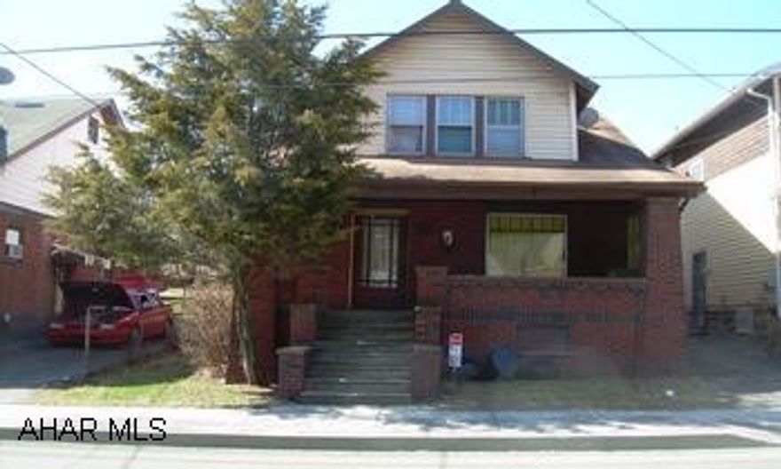 2 Story Brick & Vinyl Property Being Sold "AS IS" - Needs Some Repairs & T.L.C. - Put A Little Sweat Equity To Work For You - Great 1st Buyer Or Investor - Owner Says Move This Property FAST!  Long Term Tenants @ $465.00 Per Month