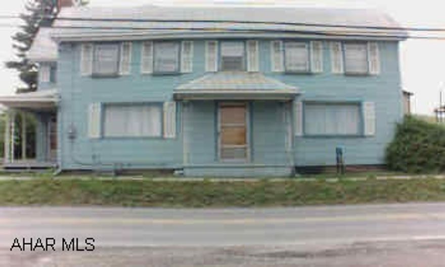 2.5 story, large rooms, garage with workshop. Large home with large rooms, barbecue in backyard, garage with workshop.