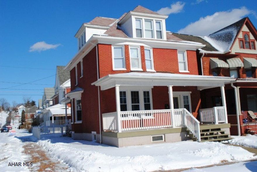 This 4 bedroom brick home has beautiful original woodwork with updated kitchen & bathroom and fenced in yard.