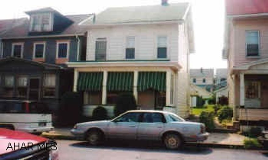 Nice 2 story aluminum & vinyl siding, some replacement windows, 2 solar shield windows, living room, formal dining room, eat-in kitchen, all appliances stay, range is 10 mo old, 2 car garage.